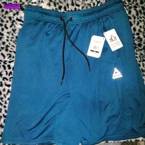 M/M/M New w/tags (1)Pair of Reebok Core Shorts- Blue Wing Teal-Slim 9" Slim 23cm